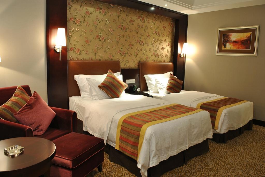 Qingyuan International Hotel Habitación foto