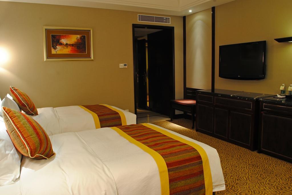 Qingyuan International Hotel Habitación foto