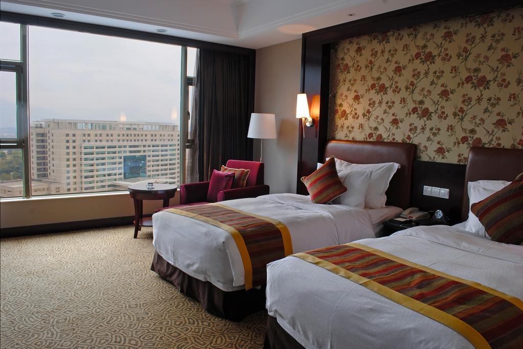 Qingyuan International Hotel Habitación foto